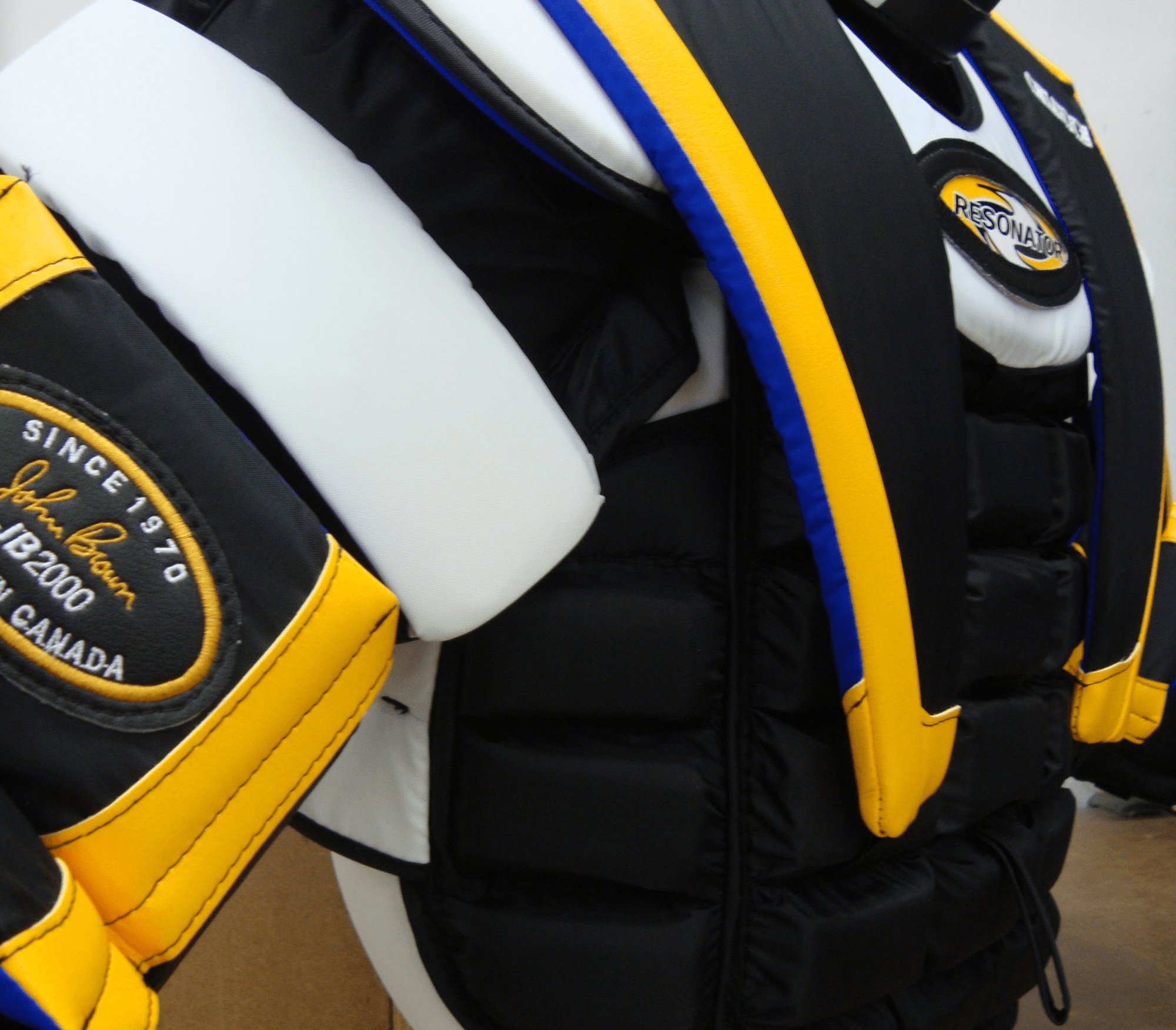 Arm with torso protection in background